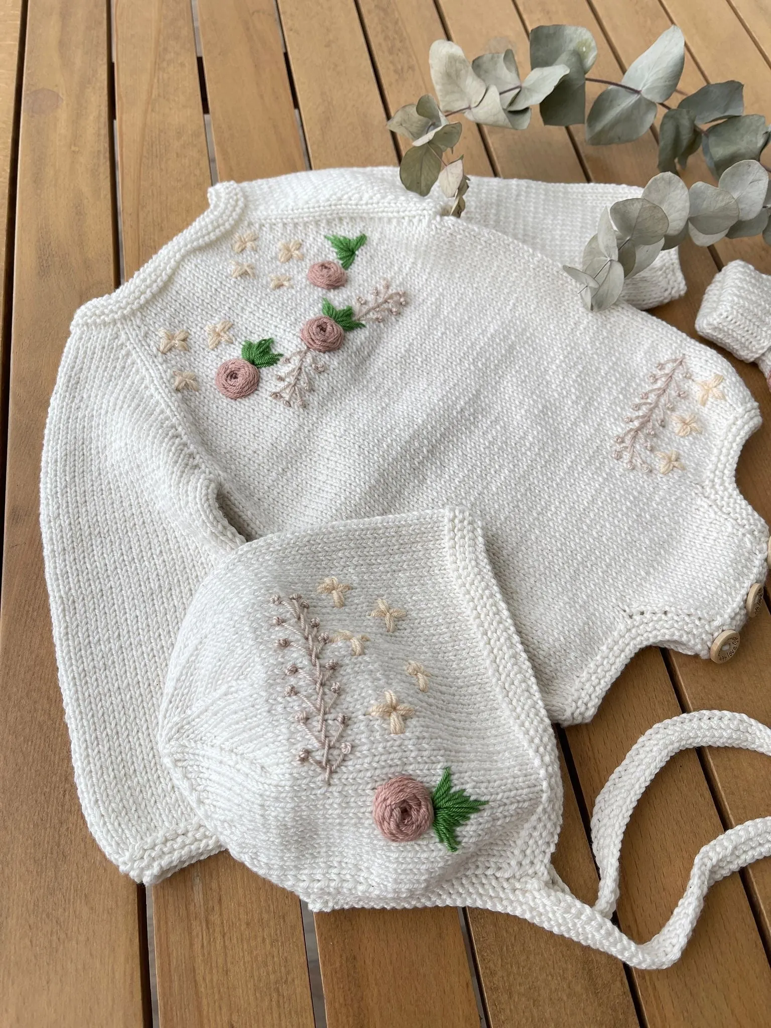 Beautiful Ivory Hand Knitted 3 piece set with floral details.