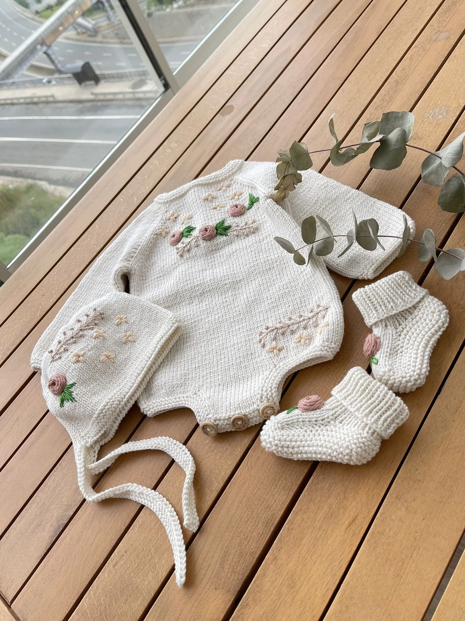 Beautiful Ivory Hand Knitted 3 piece set with floral details.