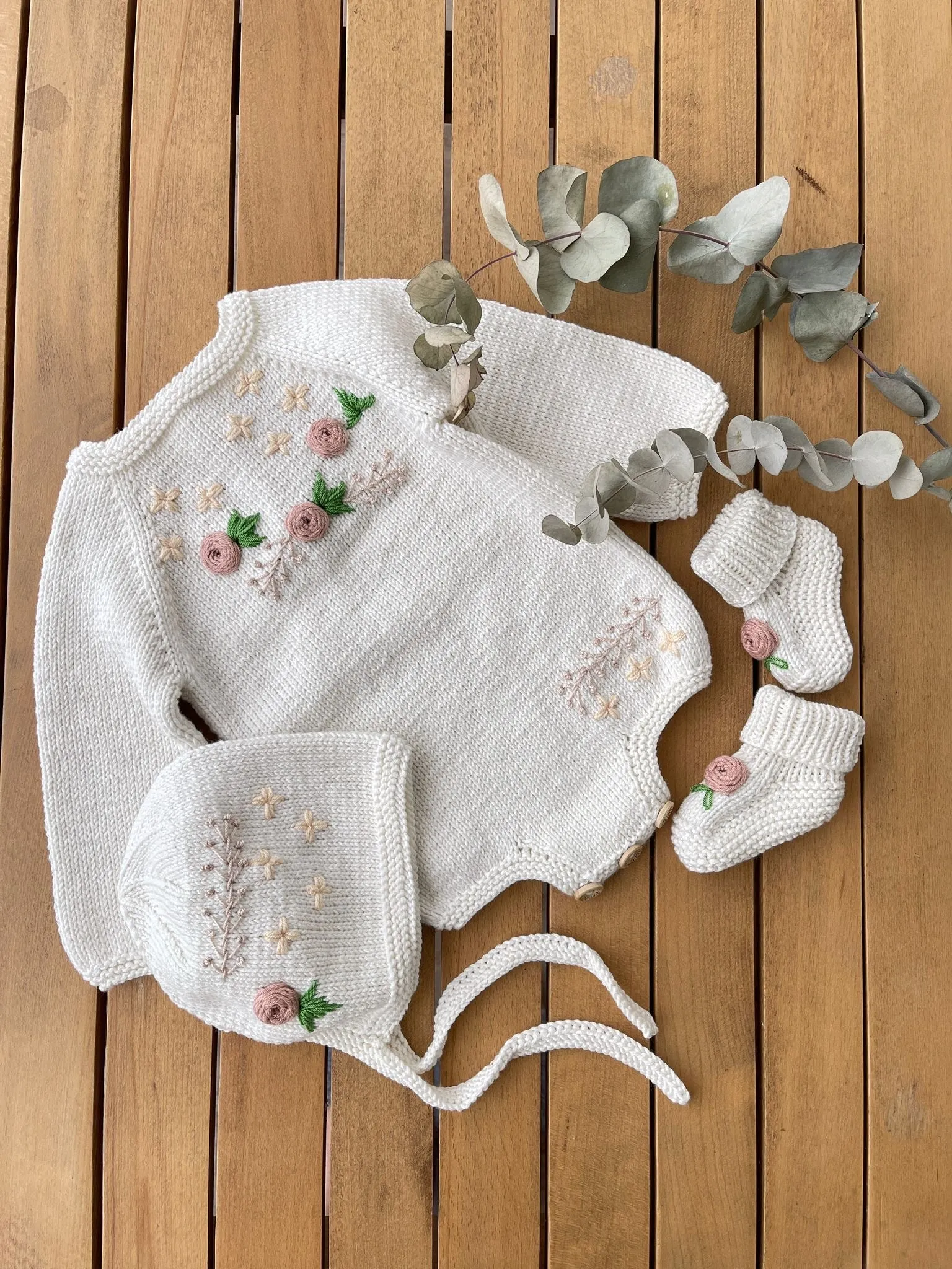 Beautiful Ivory Hand Knitted 3 piece set with floral details.