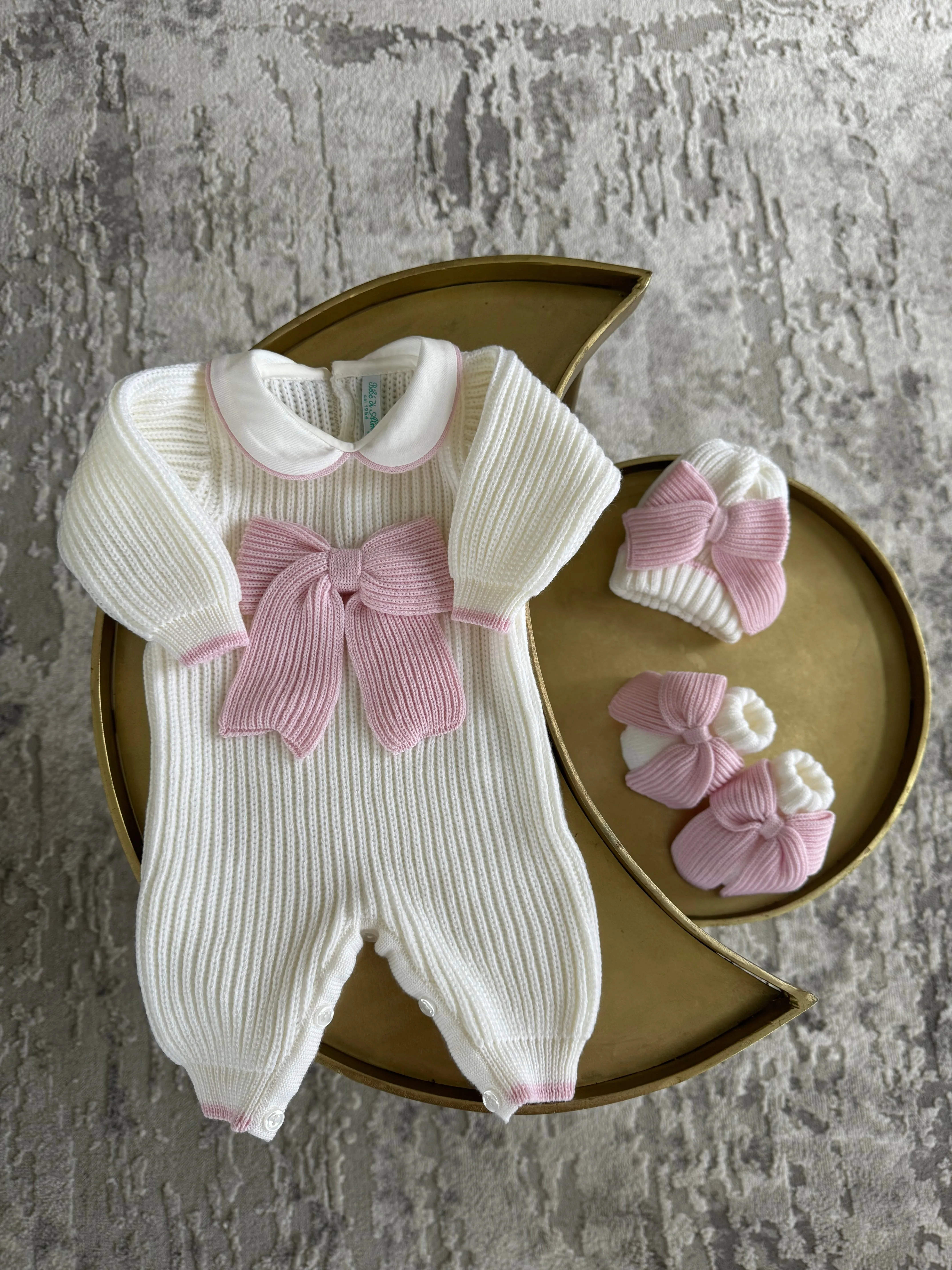 Beautiful knitted Merino wool Ivory/White Baby girl hat with Bow details.