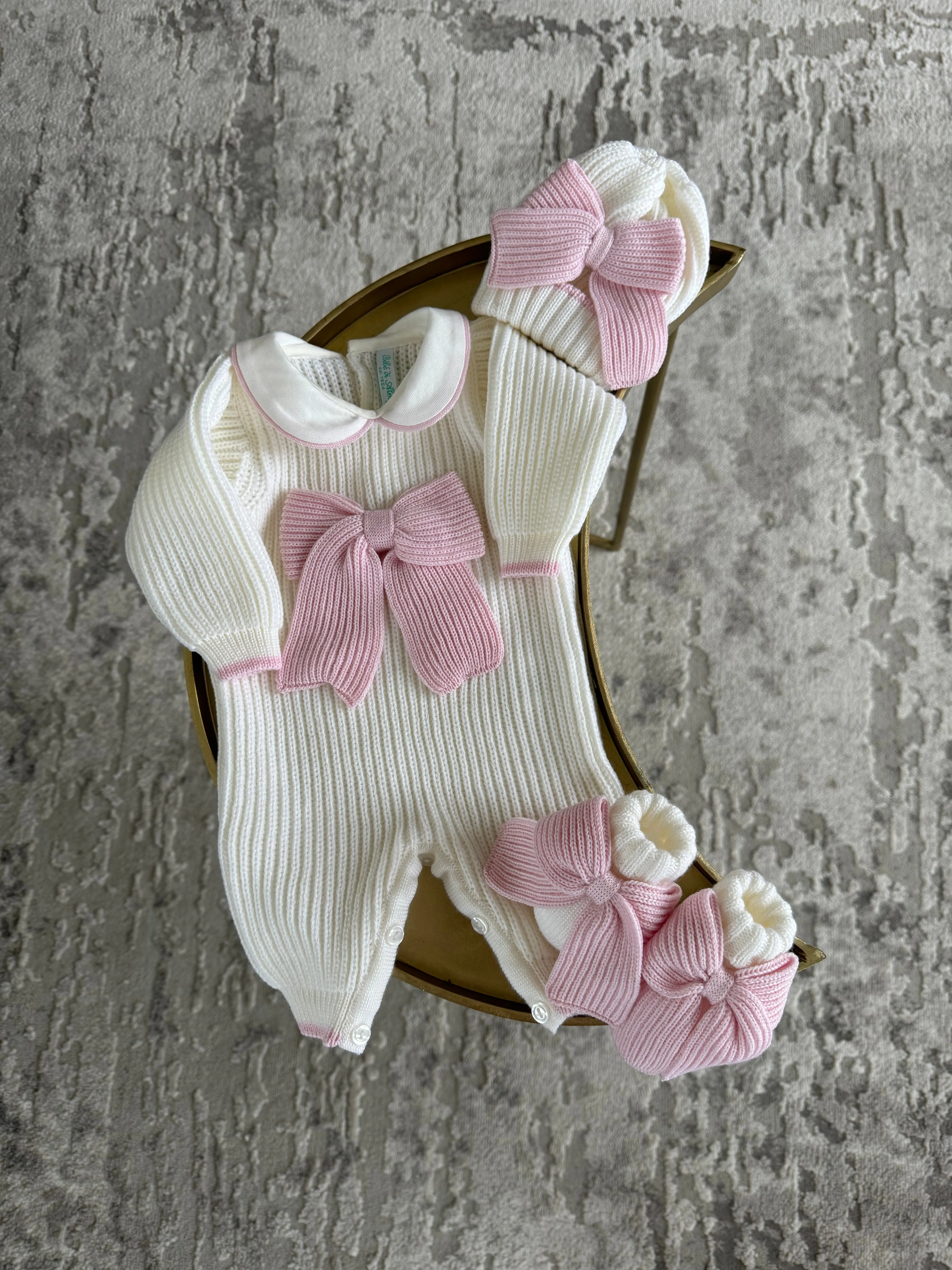 Beautiful knitted Merino wool Ivory/White Baby girl hat with Bow details.