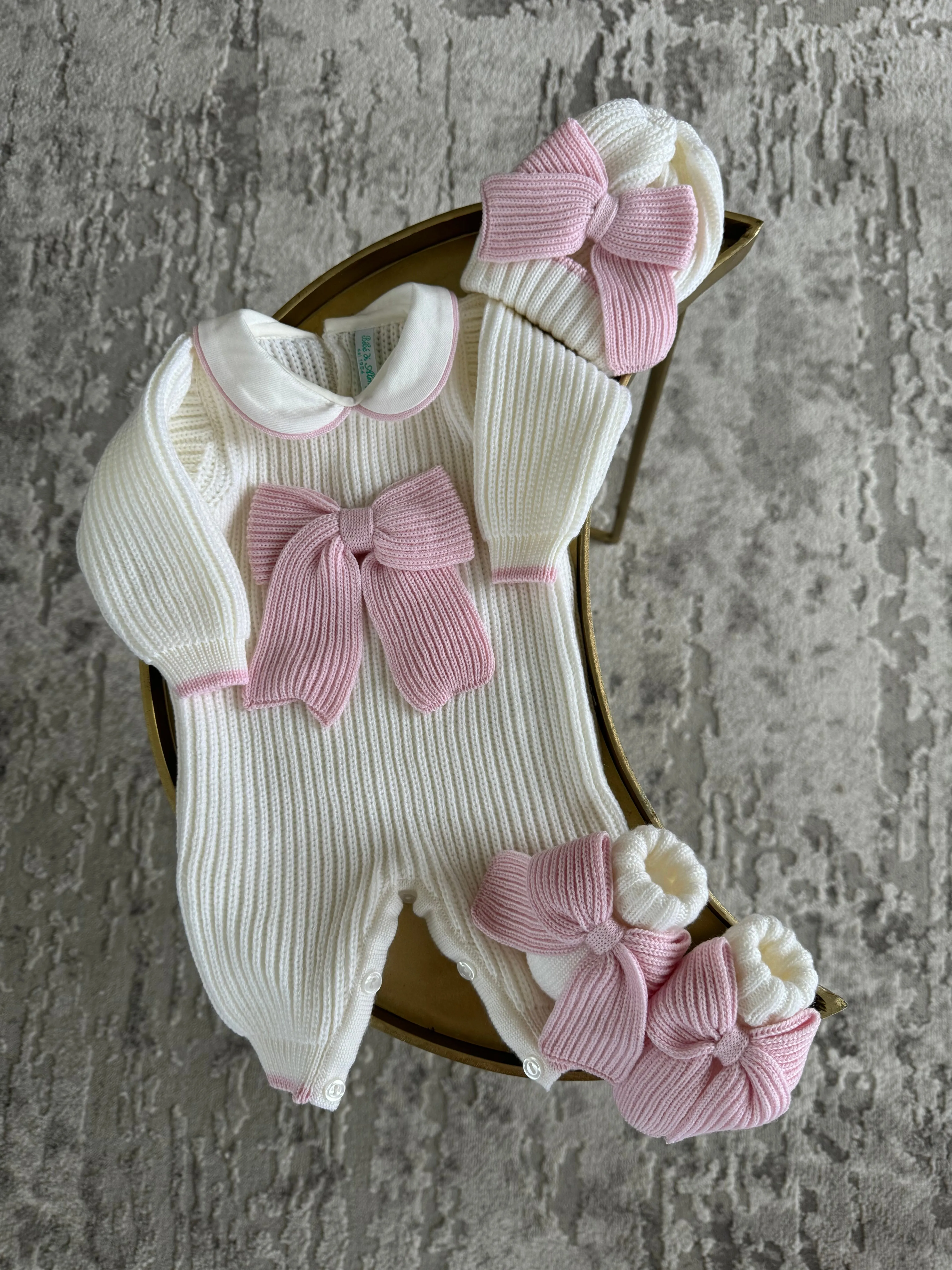 Beautiful knitted Merino wool Ivory/White Baby girl hat with Bow details.