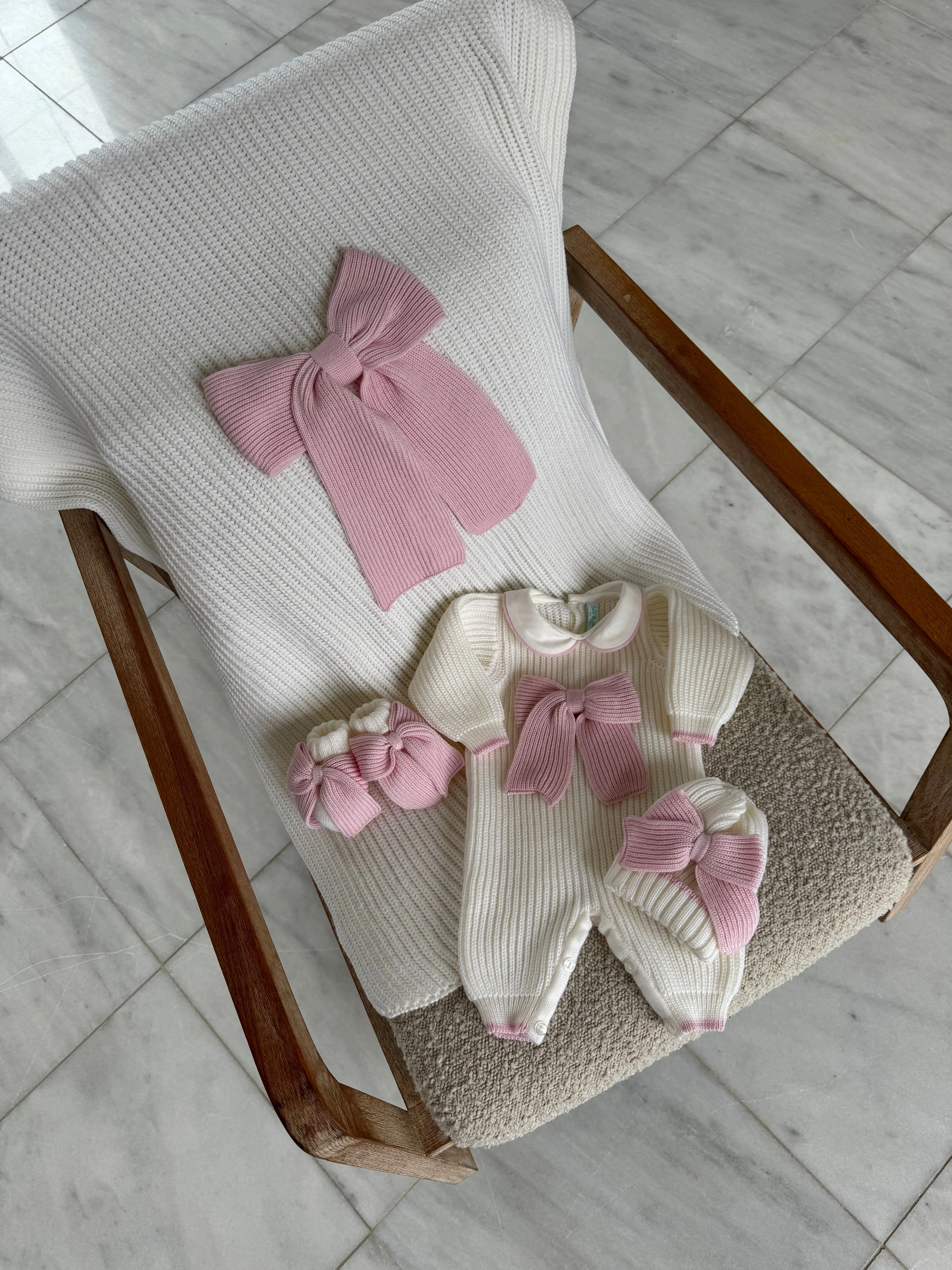 Beautiful knitted Merino wool Ivory/White Baby girl hat with Bow details.