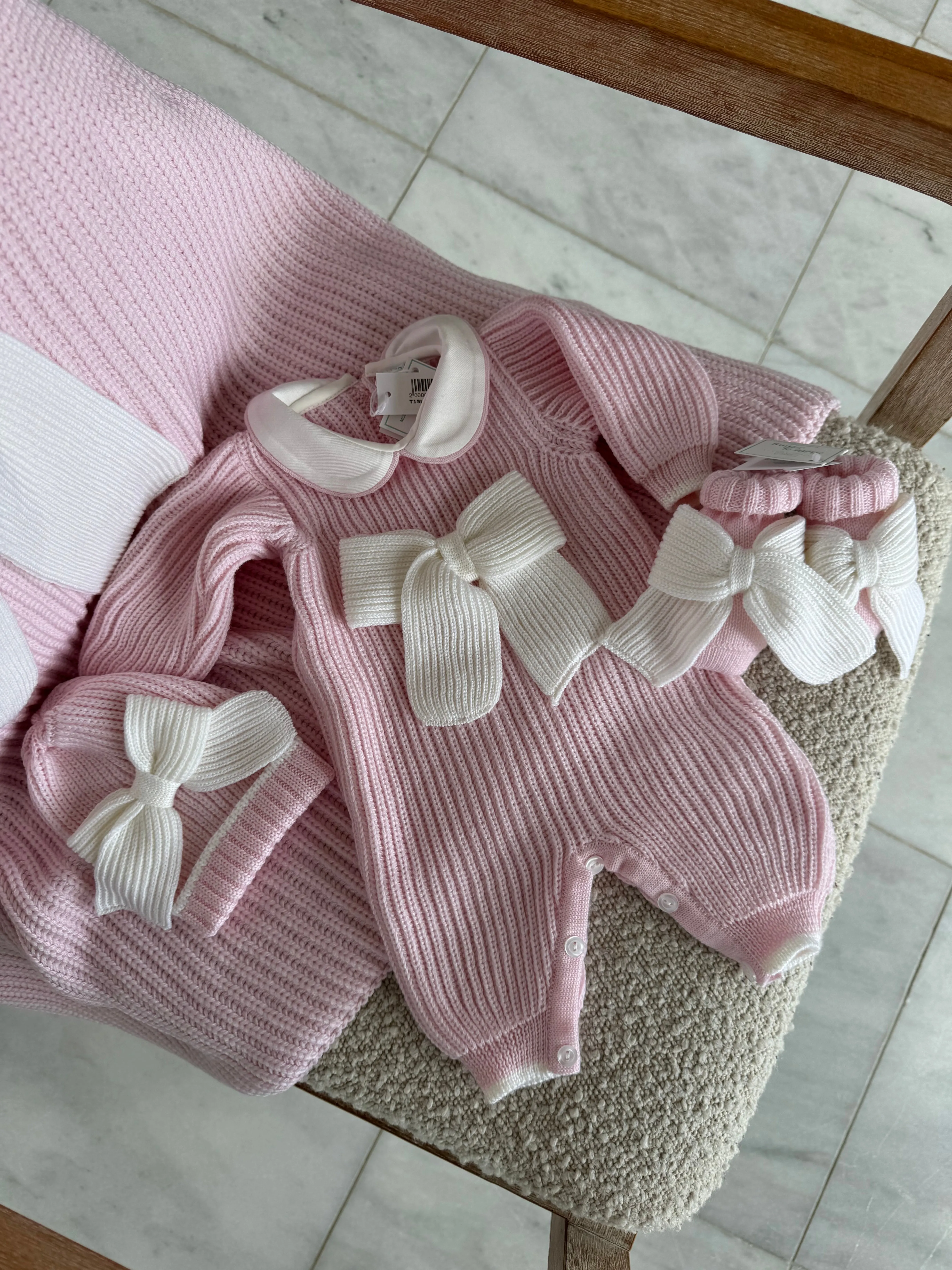 Beautiful knitted Merino wool Pink Baby girl hat with Bow details. (C)
