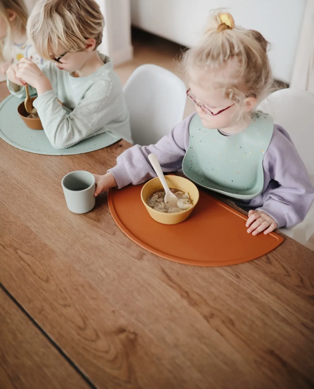Mushie Silicone Baby Bib in Cambridge Blue Confetti